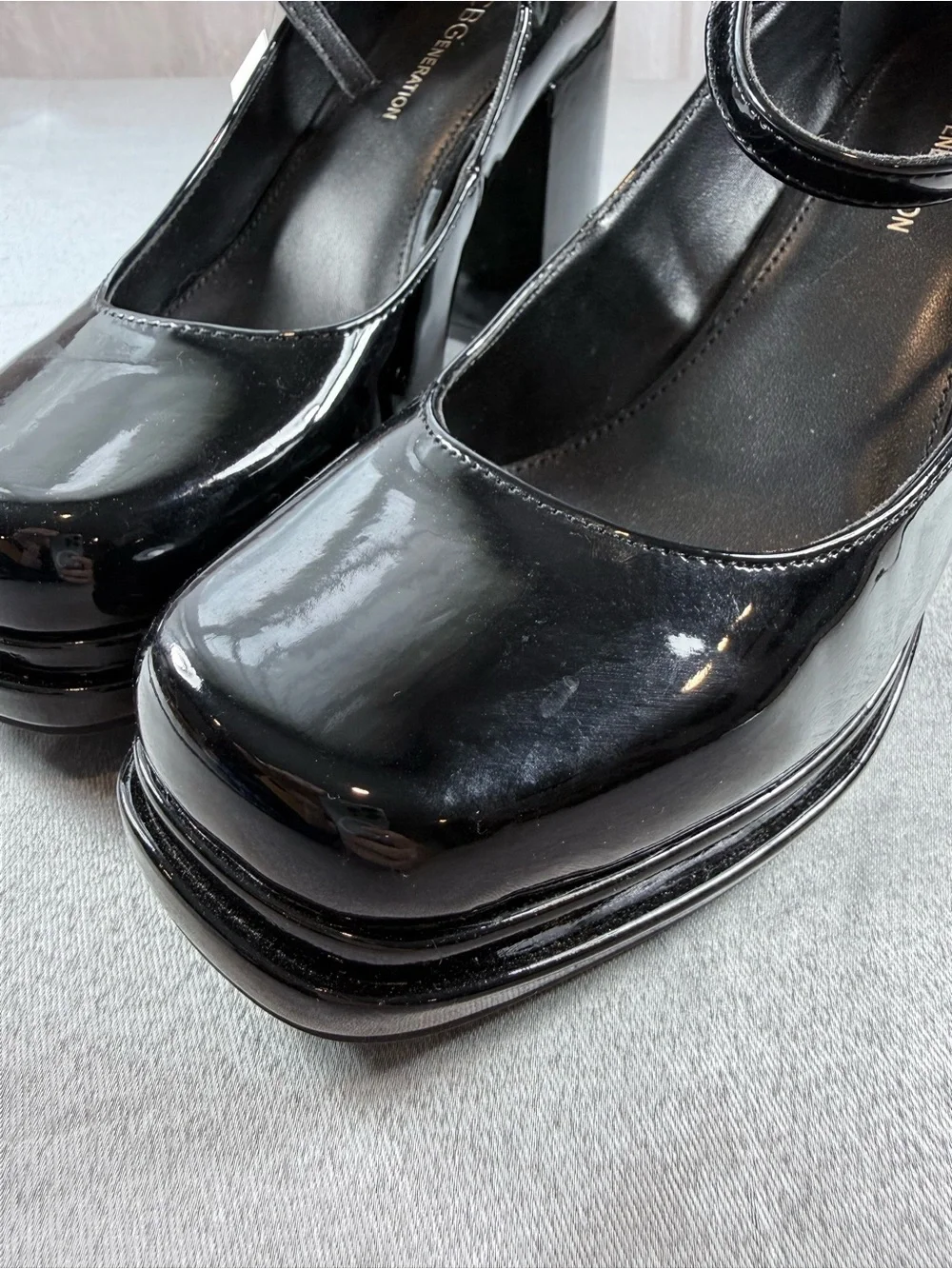 BCBGeneration Black Patent Platform Pumps